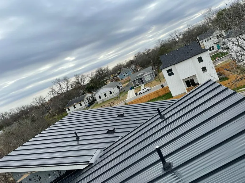 Standing seam metal roof panels with vents for Skylight Repair in Williamsville